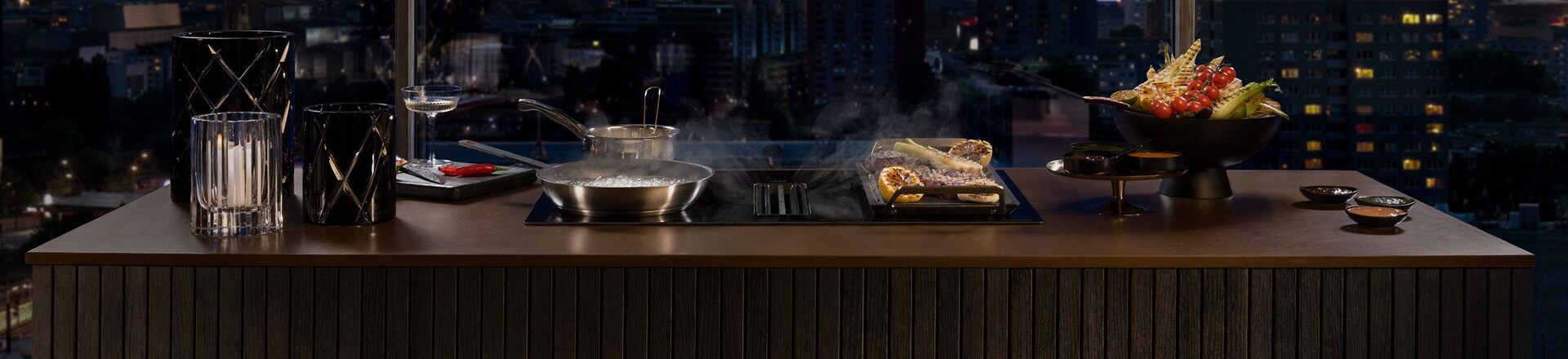 Induction hobs with extractors